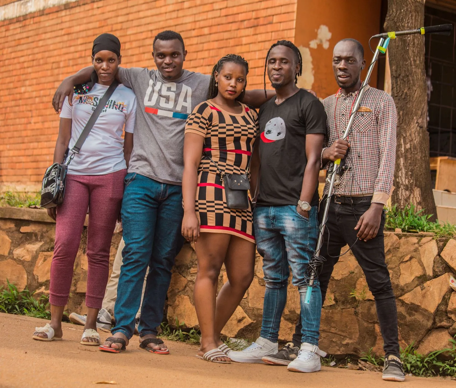 A group of young people standing side by side