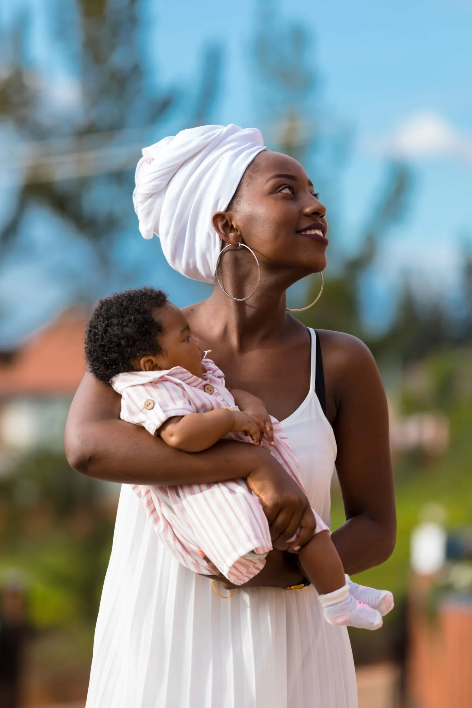 A young mother outdoors with her child